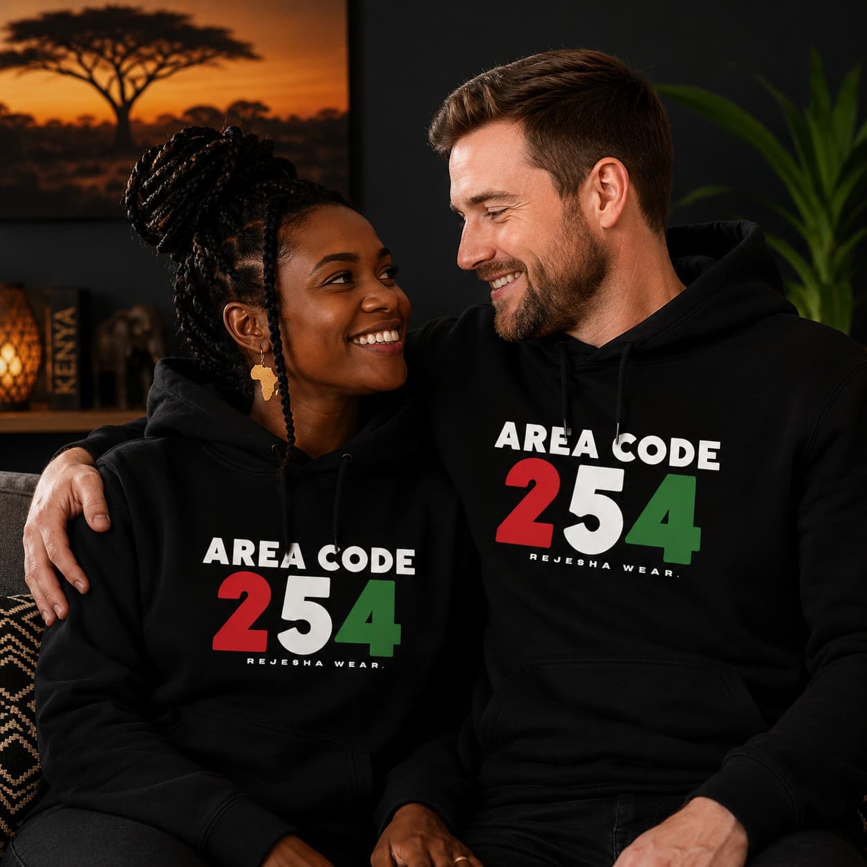 Couple wearing REJESHA Area Code 254 hoodies in Kenyan flag colors, part of the Kenyan pride apparel collection for the diaspora